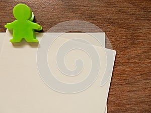 Paper note with green clip