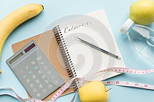 Paper notebook with calculator and pen