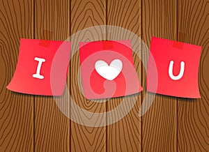 Paper notes with letter I love you on wooden background. Valentine's paper notes.