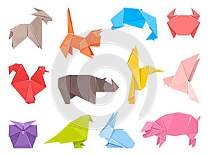 Paper origami animals and birds. Folded colored sheets, fauna decorative shapes, low polygonal toys simple design photo