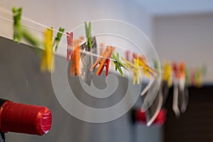 paper photograph drying wire with hooks in analog darkroom