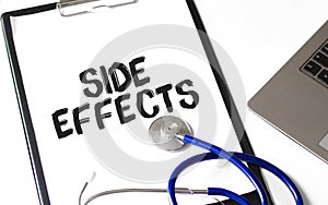 Paper plate text Side Effects, medical concept