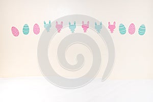 Paper Rabbits and Paper Eggs on The Wall Background