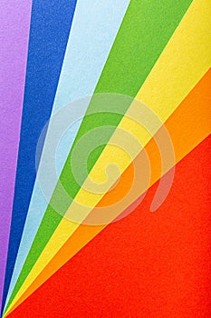 Paper rainbow colored rays stripes background