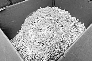 Paper recycle concept,white shredded paper documents to recycle in the cardboard box