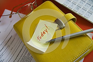 Paper with a reminder and stationery