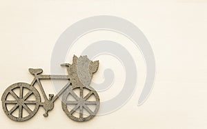 Paper retro bicycle silhouette on white background with copy space. Travel and vacation concept.