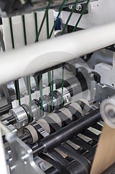 Paper rolling machine