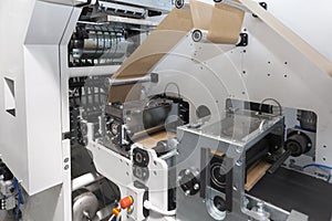 Paper rolling machine