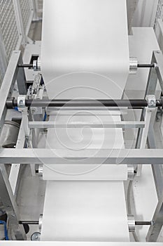 Paper rolling machine