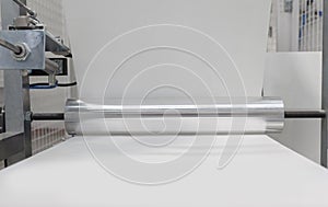 Paper rolling machine