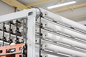 Paper rolls on conveyor