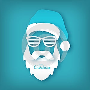 Paper Santa Claus with glasses shutter shades on blue background.