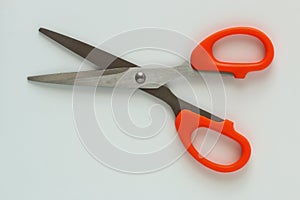 Paper scissors, orange handle