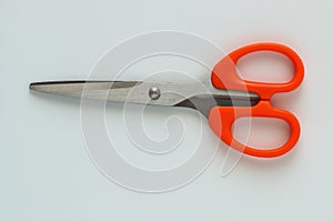 Paper scissors, orange handle