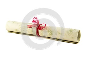 Paper scroll with ribbon bow isolated on white background photo.