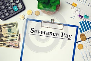 Paper with Severance Pay on the table