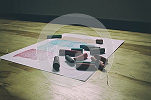 Paper sheet and color chalks