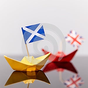 Paper ship with british and scots flag
