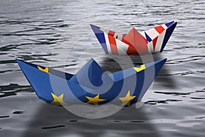 Paper ships made as European Union and British flags sailing side by side in the water - concept showing England and European Unio