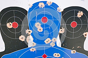 Paper Shooting Target with Bullet Holes - Graphic - Gun Range