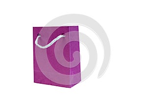 Paper shopping bag with handles on white background. Mockup for design.