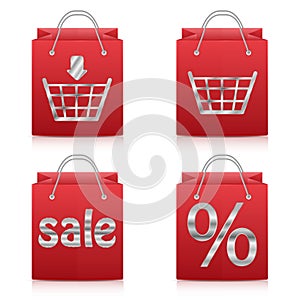 Paper shopping bags in red on white background