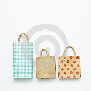 Paper shopping bags on white background