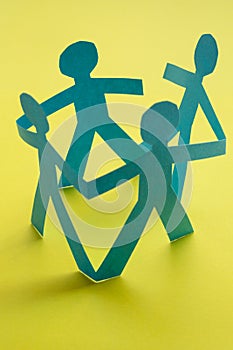 Paper silhouettes representing various ideas about unity photo