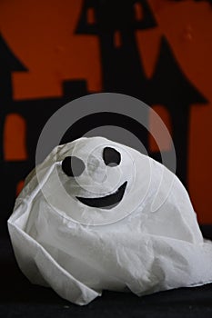 Paper smiling face spooky doll.