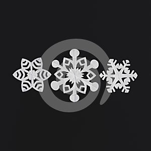 Paper snowflakes on a black background, handmade new year decoration