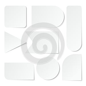 Paper stickers. Blank white labels, tags of different shapes. Isolated vector set