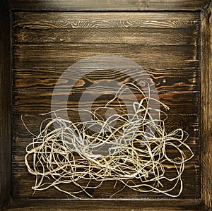 Paper straw decor on a wooden Board