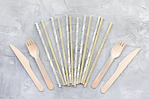 Paper straws and wooden knives and forks