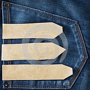Paper tag on blue denim jeans pocket