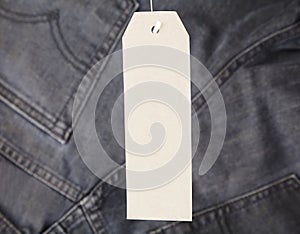 Paper tag on jeans, branded label