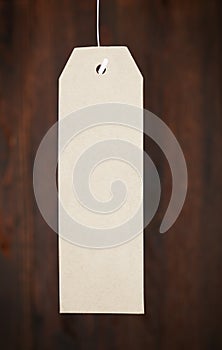 Paper tag on a woody background