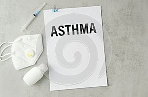 text ASTHMA on a table with stethoscope. Medicina photo