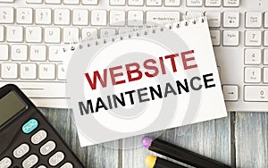 paper with text Website Maintenance