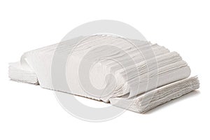 Paper towel piles isolated on a white background with a clipping path. Hygiene, health care, and safety concepts