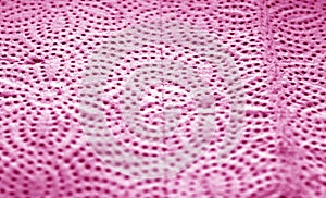 Paper towel surface with blur effect in pink color
