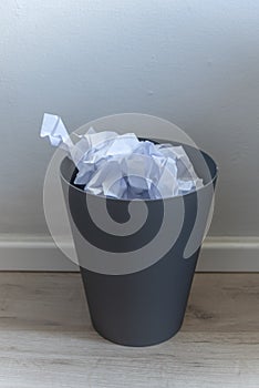 Paper trash. crumple paper falling to the recycling bin, Was thrown to basket bin, Overflowing waste paper in office