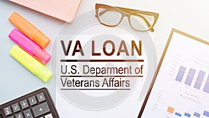 Paper with VA loan on a table
