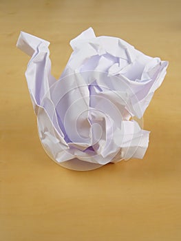 Paper wad on desk