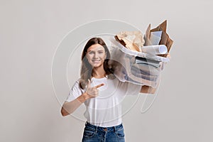 Paper Waste Recycle. Millennial Lady Holding Plastic Container Filled With Cardboard Trash