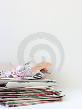 Stack of paper waste on white background