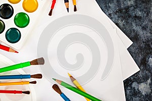 Paper, watercolor paints, brushes for painting, colour pencils