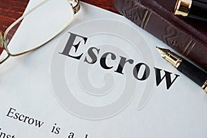 Paper with word Escrow