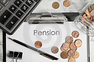 Paper with word PENSION, coins, calculator and pen on table, flat lay