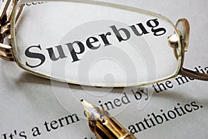 Paper with word superbug and glasses.